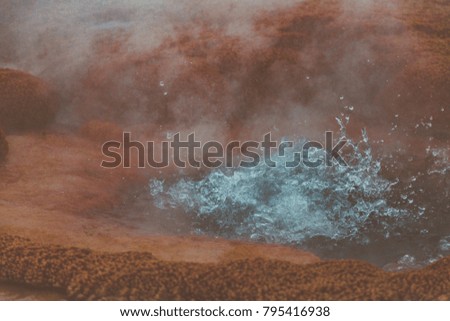 Closeup of water boiling in hot springs at Yellowstone National Park