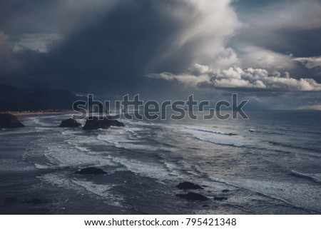 Canon beach. Oregon Coast. Haystack Rock Cloudy beach view. Pacific north west. Nature. Storm approaching the coast.