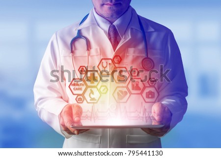 Medical Healthcare Concept - Doctor in hospital with icons in modern interface showing symbol of medicine, innovation, treatment, emergency service, data analysis and patient health.
