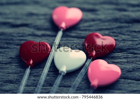 Valentine's Day and Love heart decoration concept closeup blur wooden background