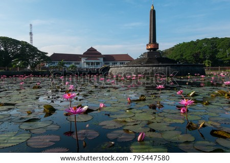 Tugu Malang as the main landmark of Malang City in East Java, Indonesia Royalty-Free Stock Photo #795447580