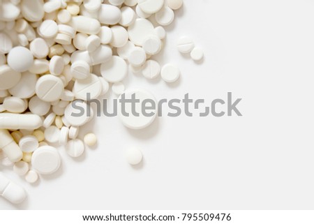 white and colored tablets