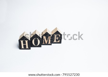 Decorative letters forming the word HOME on a white background