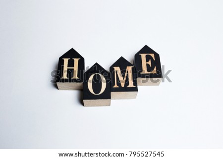 Decorative letters forming the word HOME on a white background