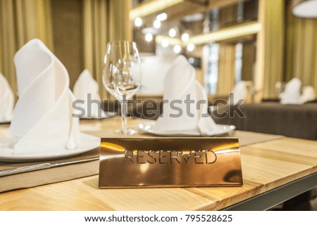 Plate reserve in the restaurant on the table