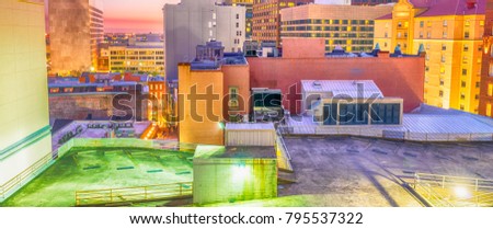 Night aerial skyline of New Orleans, Louisiana from rooftop.