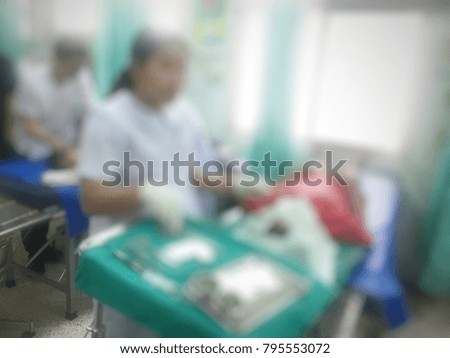 Blur the nurse care and suture the patient in emergency room