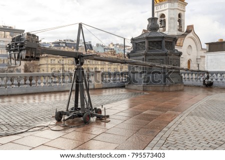 Professional crane for camcorders. Equipment for television reporting on the open air.