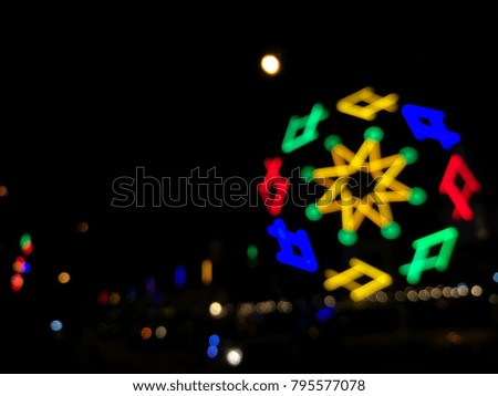 Blurred abstract background of festival vintage with neon light, remind of fun childhood