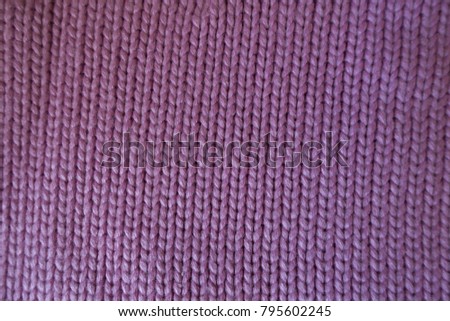 Handmade pink plain knit stitch fabric from above