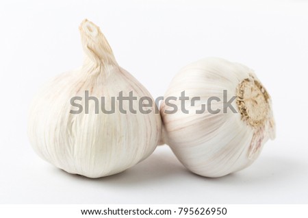 Fresh garlic isolated on white background. Raw garlic Royalty-Free Stock Photo #795626950