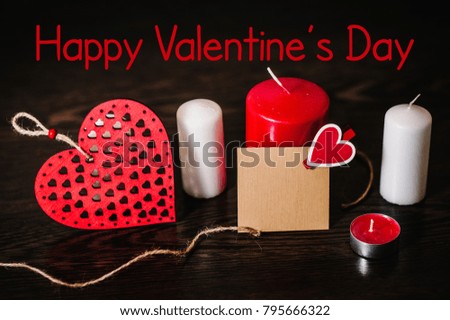 Text happy Valentine's Day. Space for text. Writing romantic letters on empty paper sheet, note for text message. Love concept with candle. Empty greeting card with red hearts for graphic design.
