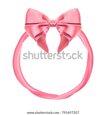 Circular frame from pink present silk bow and ribbons isolated on white background