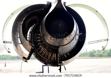 Picture of jet engine open one side of cowling.