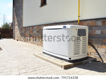 Residential house natural gas backup generator. Choosing a location for house standby generator. Royalty-Free Stock Photo #795716338