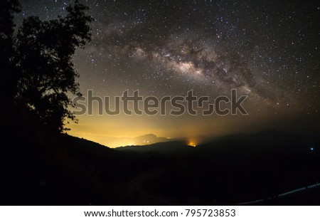 High mountains in the night with stars and Milky way in the night sky very beautiful.