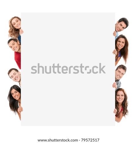 Happy smiling group of friends showing blank placard board to write it on your own text isolated on white background