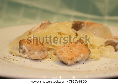 culinary dish from fish with noodles and cheese