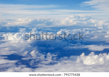 The clouds from the airplane window Royalty-Free Stock Photo #795775438