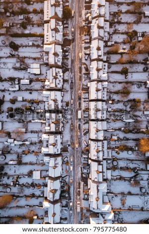 Bird's Eye View of Snowy Streets at Sunrise