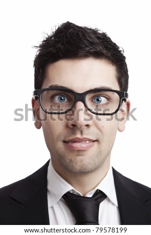 Funny portrait of a young businessman with crooked eyes wearing nerd glasses Royalty-Free Stock Photo #79578199