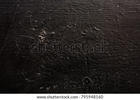 Black grunge texture background. Abstract dark grunge texture on black wall.