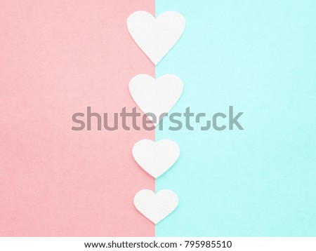Mockup. Hearts from paper cards. Pink and blue paper background. Valentine's day concept.