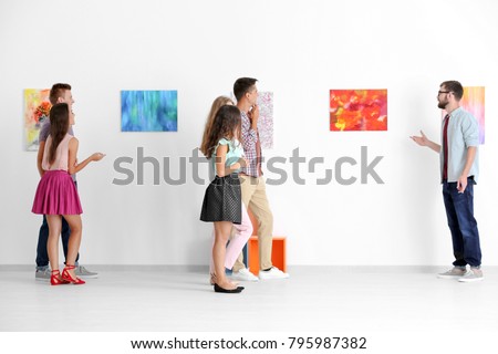 Group of people in art gallery