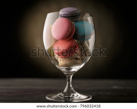 delicious macarons in glasses