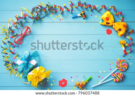 Colorful birthday or carnival background with party items. Festivity concept