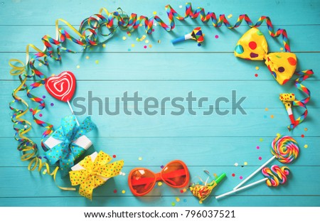 Colorful birthday or carnival background with party items. Festivity concept