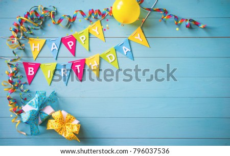 Happy birthday party background with text and colorful tools, top view