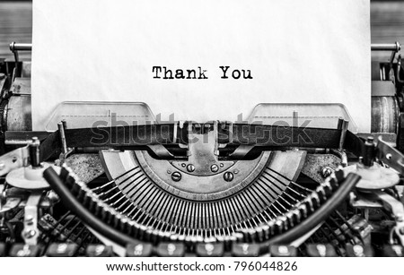 Vintage typewriter on white background with text thank you.. Close up. Royalty-Free Stock Photo #796044826