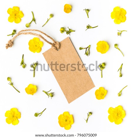 Vintage sale tag design and yellow flowers pattern on white background. Flat lay.