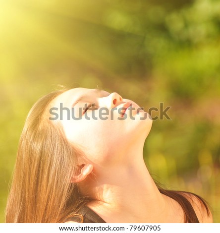 Young girl enjoying the sun