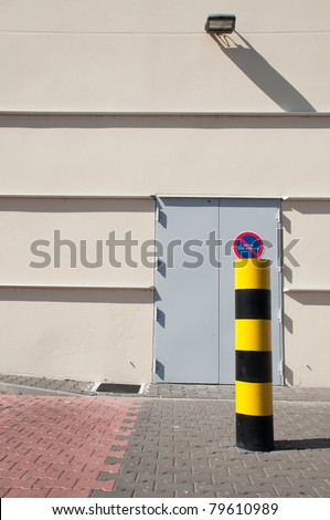 industrial warehouse with emergency exit door (parking vehicles is strictly forbidden)