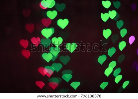 Colorful lighting heart bokeh background for Valentine's day.