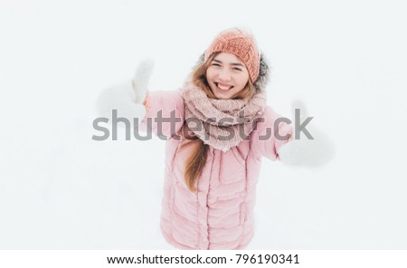 Young positive girl shows gesture hands, super, class, winter morning, happy beautiful, the picture for advertising, insert text