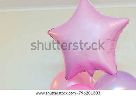colorful balloons background in pastel pink tones