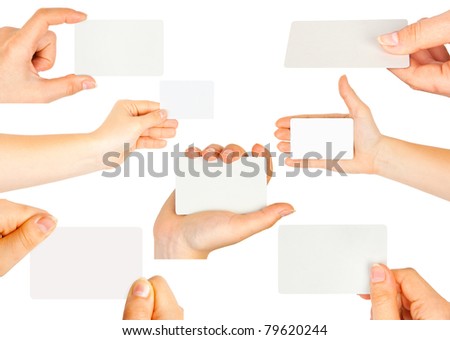 Collection of card blank in a hand on white background