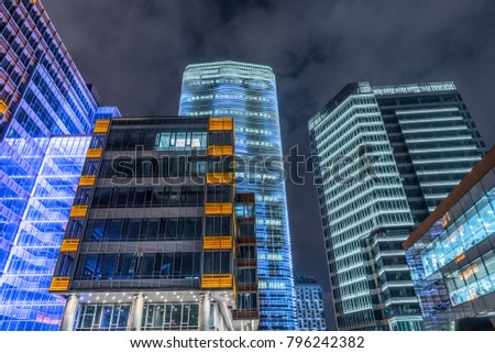 low angle view of illuminated modern building exterior