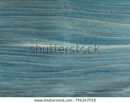 Blue wood texture. Navy blue wood background. Closeup view of blue wood texture for designers.