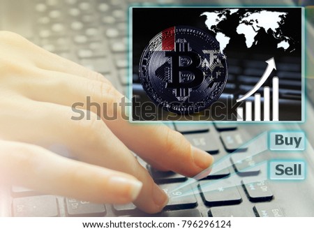 Hand of the girl on the keyboard close up with an abstract futuristic screen hologram, the concept of digital technology on the purchase and sale of crypto currency bitcoin with a flag of French