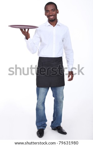 Casually dressed waiter with a drinks tray