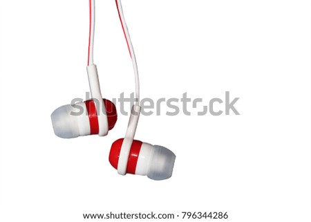Close up on red earbuds isolated on white background, sound