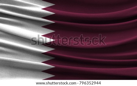 Realistic flag of Qatar on the wavy surface of fabric