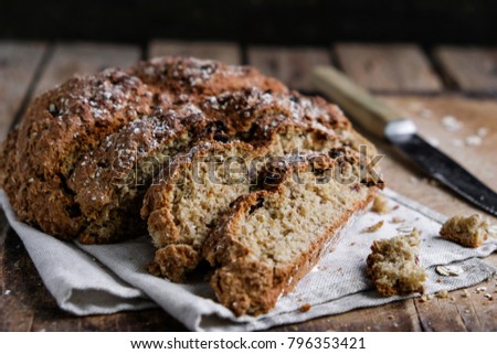 homemade bread on a wooden background Royalty-Free Stock Photo #796353421