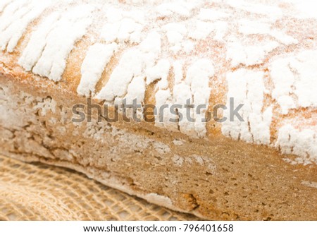 Black Bread Texture with Selective Focus on Rustic Background