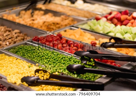 Salad bar at Wholefoods  Royalty-Free Stock Photo #796409704