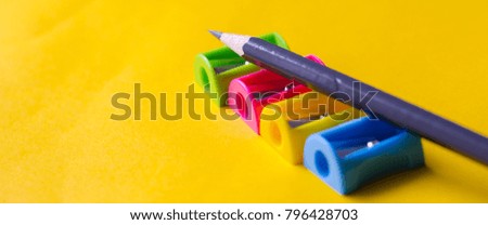 pencil,sharpener,beautiful yellow background
